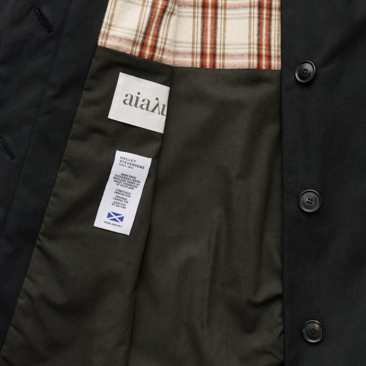 noor coat oil - black - logo